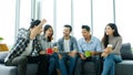 Group of happy creative team talking while taking coffee break at office Royalty Free Stock Photo