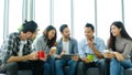 Group of happy creative team talking while taking coffee break at office Royalty Free Stock Photo