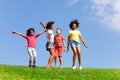 Group of happy dancing and jumping children Royalty Free Stock Photo