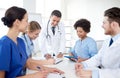 Group of happy doctors meeting at hospital office