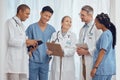 Group of happy doctors, nurses and checklist in hospital, meeting and planning surgery or team schedule. Healthcare Royalty Free Stock Photo