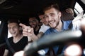 Group of happy friends on a car Royalty Free Stock Photo