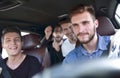 Group of happy friends on a car Royalty Free Stock Photo