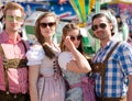 Group of happy friends celebrating Oktoberfest