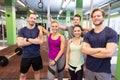 Group of happy friends in gym Royalty Free Stock Photo