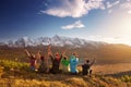 Group happy friends having fun mountain top