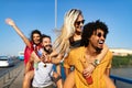 Group of friends having fun, traveling, smiling together outdoors Royalty Free Stock Photo