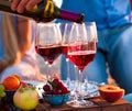 Group of happy friends having red wine on the sunset beach. Royalty Free Stock Photo