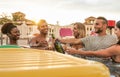 Group happy friends making a pool party cheering with champagne at sunset - Young people laughing and having fun toasting Royalty Free Stock Photo