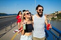 Group of happy friends people having fun together outdoors Royalty Free Stock Photo