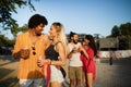 Group of happy friends people having fun together outdoors Royalty Free Stock Photo