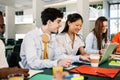 Group of happy international students studying together at college campus Royalty Free Stock Photo