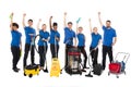 Group Of Happy Janitors With Cleaning Equipment Royalty Free Stock Photo