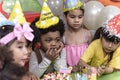 Group of happy and joyful kids have fun celebrating her birthday with Multinational friend Kids birthday celebratiion party