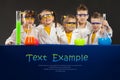 Group happy kids doing science experiments in the laboratory. Royalty Free Stock Photo