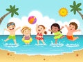 Group of happy kids having fun and splashing on the beach Royalty Free Stock Photo