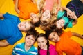 Group of happy kids laying in circle Royalty Free Stock Photo