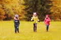 Group of happy little kids running outdoors Royalty Free Stock Photo