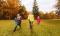 Group of happy little kids running outdoors Royalty Free Stock Photo