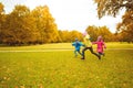 Group of happy little kids running outdoors Royalty Free Stock Photo