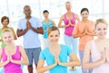 Group Of Happy Multi-Ethnic People In A Yoga Class
