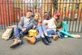 Group of happy multiracial best friends having fun using phone Royalty Free Stock Photo