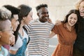 Group of happy multiracial young best friends laughing and having fun together Royalty Free Stock Photo