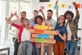 A group of happy office workers are enjoying while posing for a photo in the office. Employees, job, office Royalty Free Stock Photo