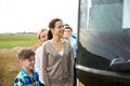 Group of happy passengers boarding travel bus Royalty Free Stock Photo