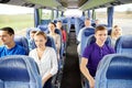 Group of happy passengers in travel bus Royalty Free Stock Photo