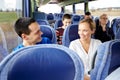 Group of happy passengers in travel bus Royalty Free Stock Photo