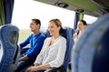 Group of happy passengers in travel bus Royalty Free Stock Photo