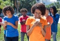 Group of happy people with cellphones