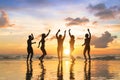 Group of happy people dancing at beach full moon party Royalty Free Stock Photo