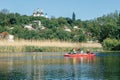 Ukraine, the city of Romny, May 22, 2021: A group of happy people are kayaking on the river. Concept of World Tourism Day. Active