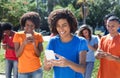 Group of happy people using 4g with phone Royalty Free Stock Photo