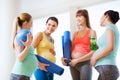 Group of happy pregnant women talking in gym Royalty Free Stock Photo