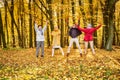 Group of happy senior friends having fun in autumn park Royalty Free Stock Photo