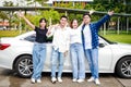 Group of happy smiling Asian teenagers having fun Travel by car.