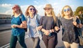 Group of happy smiling carefree young stylish girl go for a walk Royalty Free Stock Photo