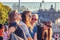 Group of happy smiling carefree young stylish girls communicate Royalty Free Stock Photo