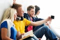 Group of happy students being on a break taking selfie Royalty Free Stock Photo