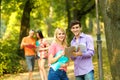 Group of happy students with books in the Park Royalty Free Stock Photo