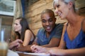 Group, happy students and learning at coffee shop, studying friends writing notes together in university. Team, people Royalty Free Stock Photo