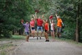 Group of happy students on the track in the Park Royalty Free Stock Photo