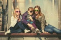 Group of happy teen girls in sunglasses on city street Royalty Free Stock Photo
