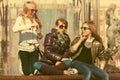 Group of happy teen girls in sunglasses on city street Royalty Free Stock Photo