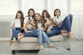 Group of happy teenage girls with gadgets. Social networks, friendship, technology and children concept.