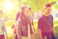 Group of happy teenage students walking outdoors Royalty Free Stock Photo