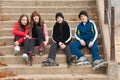 Group of happy teenagers in roller skates